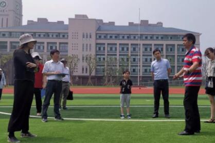 惠陽路分校運(yùn)動場塑膠跑道工程竣工報告