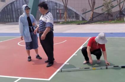 惠陽路分校運(yùn)動場塑膠跑道工程竣工報告