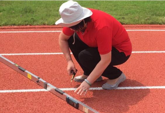 惠陽路分校運(yùn)動場塑膠跑道工程竣工報告